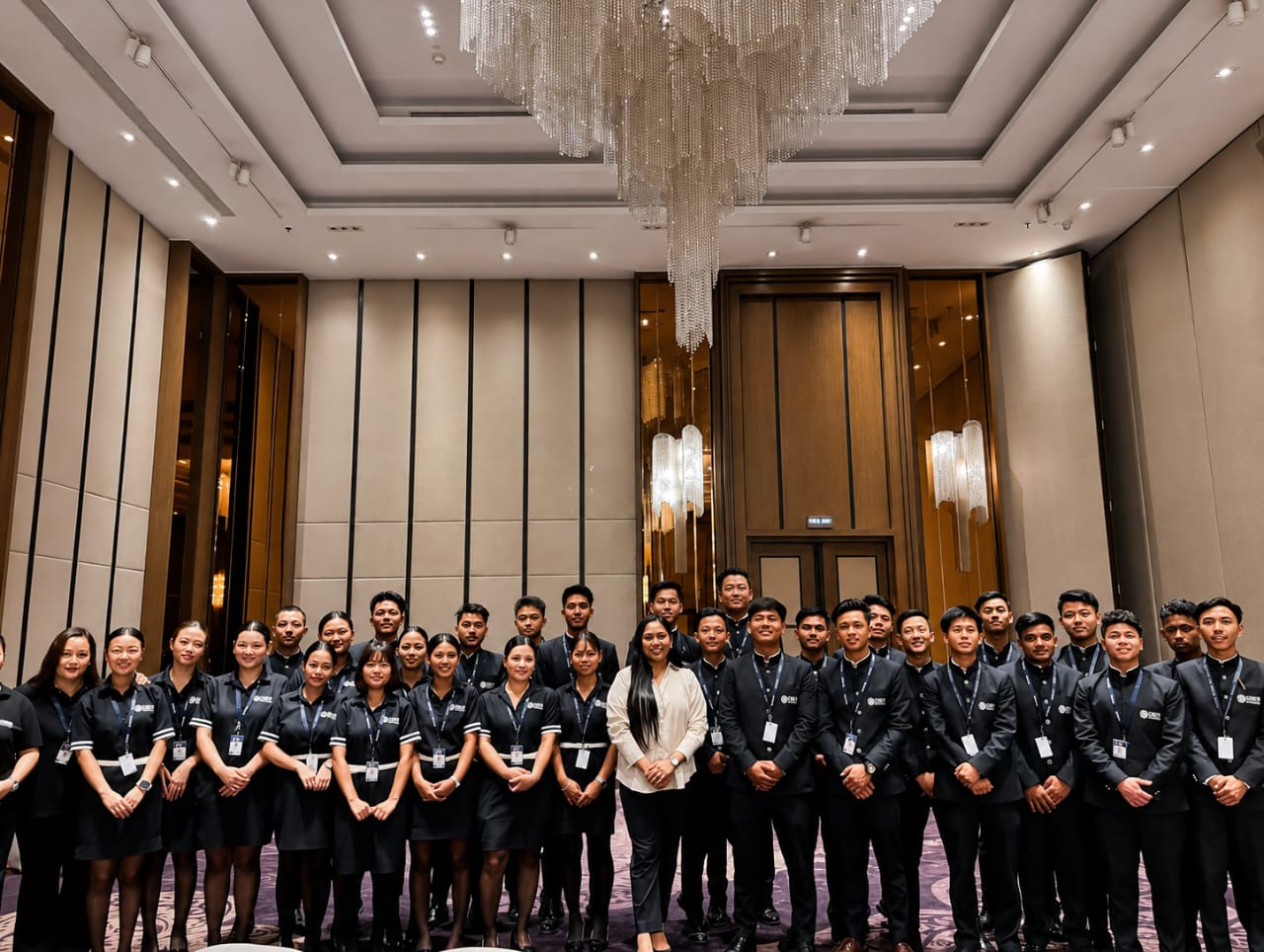 Hospitality professionals in luxury hotel setting